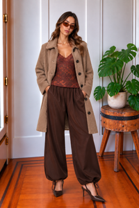 Front view of the Blythe long tan sweater jacket featuring a soft fuzzy texture, collared neckline and button-front closure.