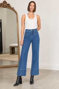 Front view of Lily Belby high-rise straight-leg jeans with pintuck seams and wide cuffed hem