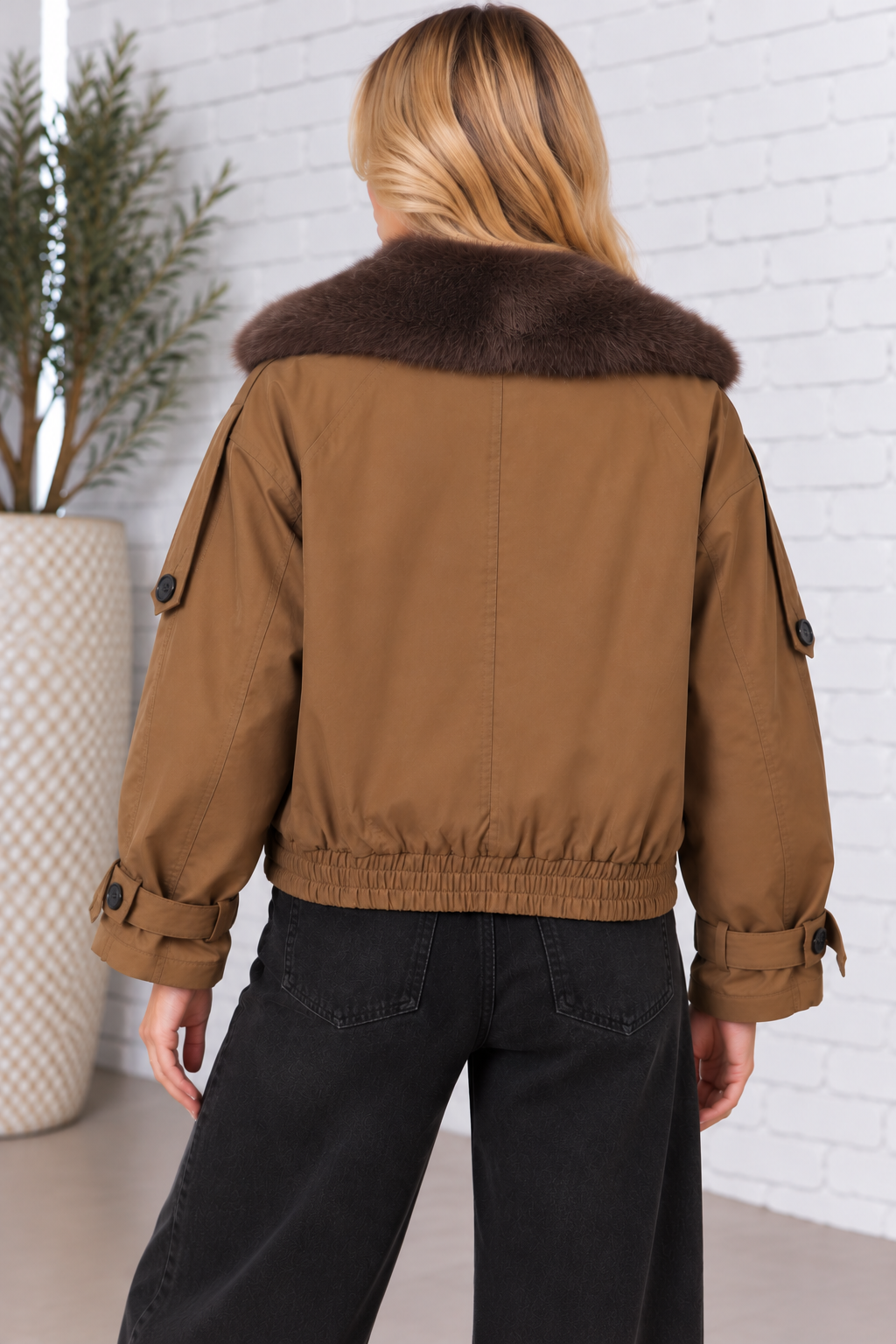 Back view of the Fur Collar Trench Jacket in teak brown, featuring a plush faux fur collar, long sleeves, and a gathered elasticized back hem.