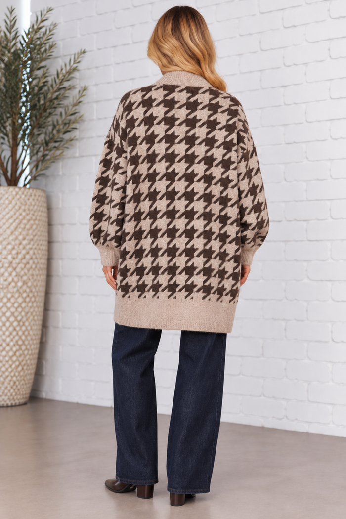 Back view of the taupe and dark brown houndstooth sweater cardigan, featuring an allover houndstooth pattern, relaxed long sleeves, and contrasting ribbed hem.