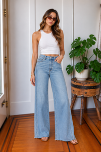 Front view of Far Out Make Believe light wash high rise wide leg jeans with paneled seam detail