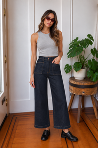 Front view of Valley Girl dark rinse high-rise wide-leg jeans with contrast stitching and patch pockets